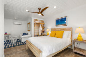 white shiplap ceiling, bed